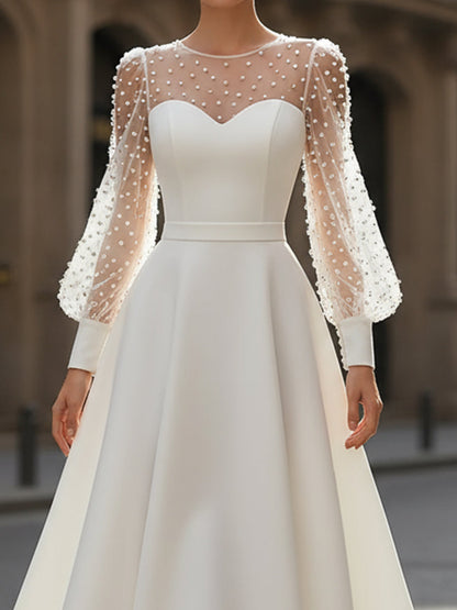Elegant White Pearl Embellished A-Line Dress