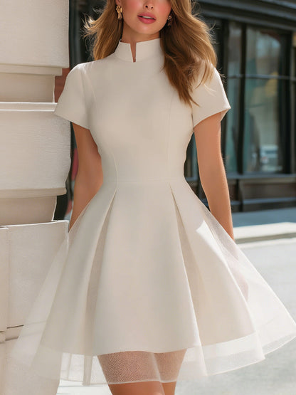 Structured High-Neck Mini Dress With Sheer Hem Panels