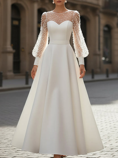 Elegant White Pearl Embellished A-Line Dress