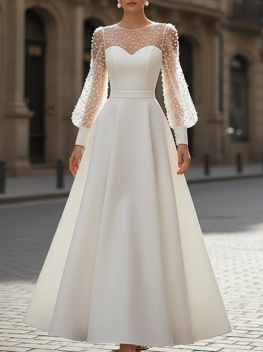 Elegant White Pearl Embellished A-Line Dress