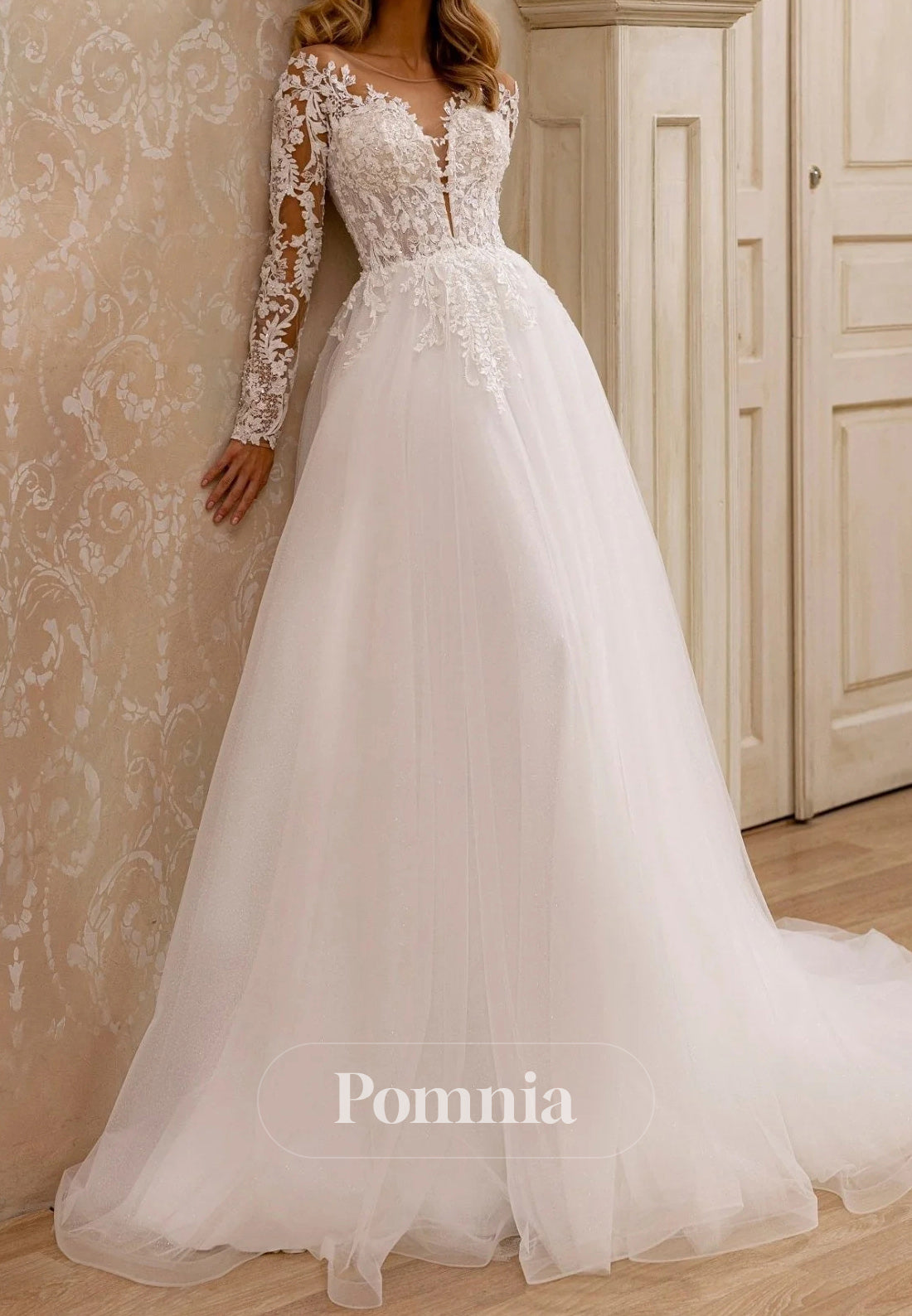 Elegant A-Line Bridal Gown with Lace Detail and Plunging Neckline